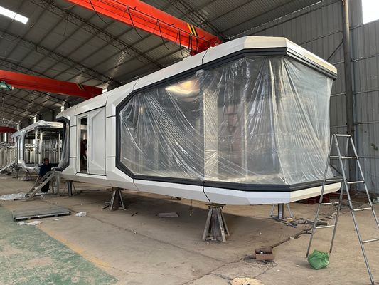 Gabinete plano transporte y carga personalizado hotel de lujo prefabricado moderno cápsula espacial casa de camping para casa pequeña