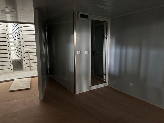 Carga de contenedores de acero 40HQ moderna personalizada portátil prefabricada de lujo panel de sándwich de lana de roca Casa de contenedores expandible