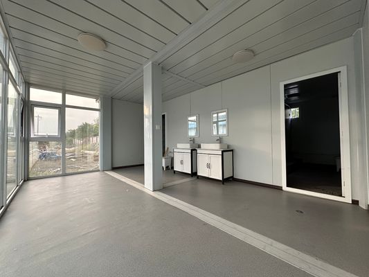 Casa de contenedores móvil de lujo de diseño de acero con paquete plano de color personalizado