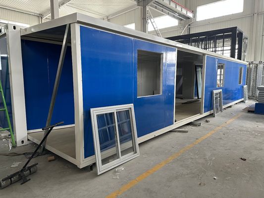 Personalización profesional de alojamiento de paquete plano Casas prefabricadas de contenedores a prueba de huracanes con 15-30 años de vida útil