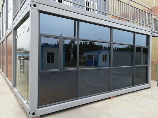 40'HQ envío impermeable Casas de cortina de vidrio moderno Modular Casa de contenedores prefabricada con puente roto Puerta de aluminio