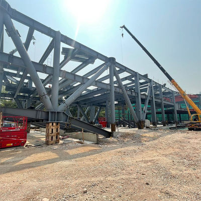 Suministro directo Instalación fácil Taller de acero Construir puerta de acero Almacén Prefabricado Almacén Edificio de estructura de acero